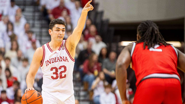 Indiana's Trey Galloway (32) directs the offense during the Indiana versus Ohio State men's basketball game at Simon Skjodt Assembly Hall on Saturday, March 8, 2025.