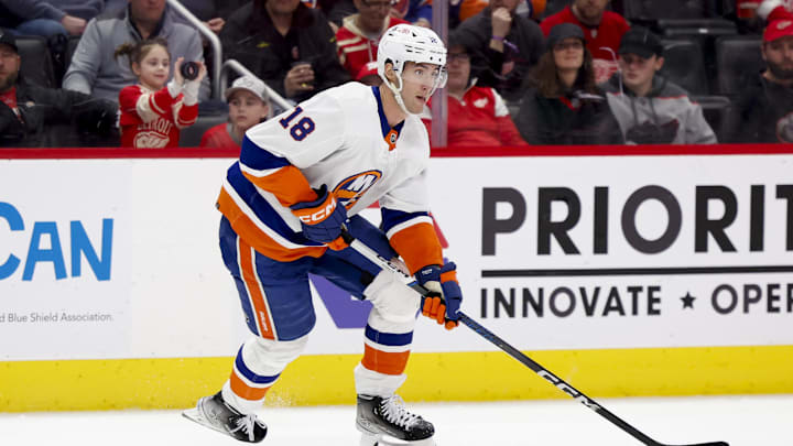Feb 29, 2024; Detroit, Michigan, USA;  New York Islanders left wing Pierre Engvall (18) skates with the puck in the third period against the Detroit Red Wings at Little Caesars Arena. Mandatory Credit: Rick Osentoski-Imagn Images