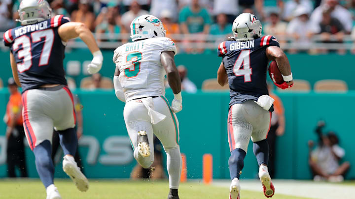 New England Patriots running back Antonio Gibson (4) carries the football for a kickoff return against the Miami Dolphins during the fourth quarter at Hard Rock Stadium in Week 2. New England Patriots running back Antonio Gibson (4) carries the football for a kickoff return against the Miami Dolphins during the fourth quarter at Hard Rock Stadium in Week 2.
