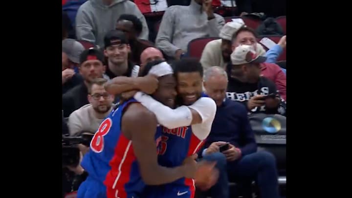 Pistons guard Beasley and center Stewart celebrate a new franchise record