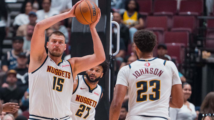 Oct 6, 2025; Vancouver, British Columbia, CAN; Denver Nuggets center Nikola Jokic (15) makes a pass against the Toronto Raptors in the second half at Rogers Arena. Mandatory Credit: Bob Frid-Imagn Images Oct 6, 2025; Vancouver, British Columbia, CAN; Denver Nuggets center Nikola Jokic (15) makes a pass against the Toronto Raptors in the second half at Rogers Arena. Mandatory Credit: Bob Frid-Imagn Images