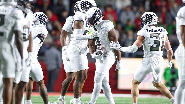 Oct 18, 2025; Piscataway, New Jersey, USA; Oregon Ducks linebacker Blake Purchase (9) reacts after recovering a fumble during the first half against the Rutgers Scarlet Knights at SHI Stadium. Mandatory Credit: Vincent Carchietta-Imagn Images Oct 18, 2025; Piscataway, New Jersey, USA; Oregon Ducks linebacker Blake Purchase (9) reacts after recovering a fumble during the first half against the Rutgers Scarlet Knights at SHI Stadium. Mandatory Credit: Vincent Carchietta-Imagn Images