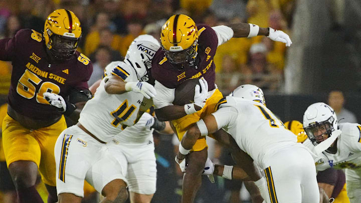 Arizona State running back Kyson Brown (1) runs for a first down against NAU during a game at Mountain America Stadium in Tempe on Aug. 30, 2025.