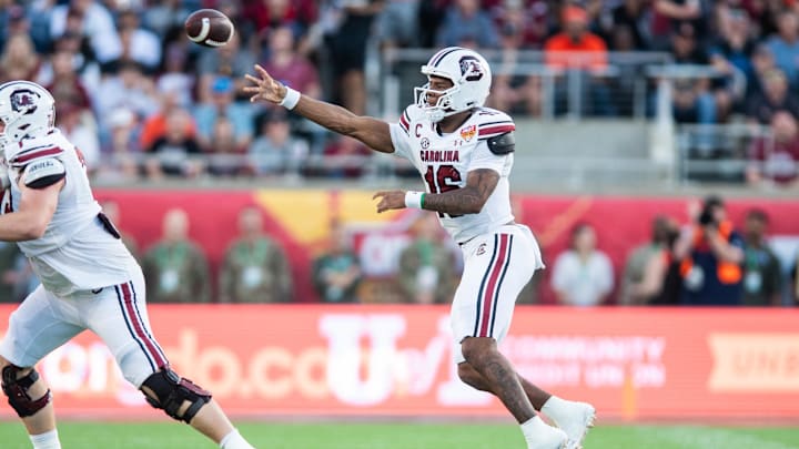 Dec 31, 2024; Orlando, FL, USA; South Carolina Gamecocks quarterback LaNorris Sellers (16) throws the ball against the Illinois Fighting Illini in the third quarter at Camping World Stadium. Mandatory Credit: Jeremy Reper-Imagn Images