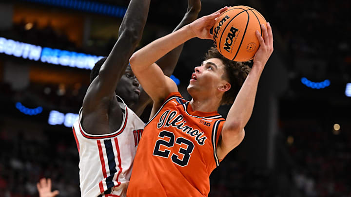 Mar 26, 2026; Houston, TX, USA; Illinois Fighting Illini guard Keaton Wagler (23) shoots the ball against Houston Cougars forward Kalifa Sakho (14) in the second half during the Sweet Sixteen.