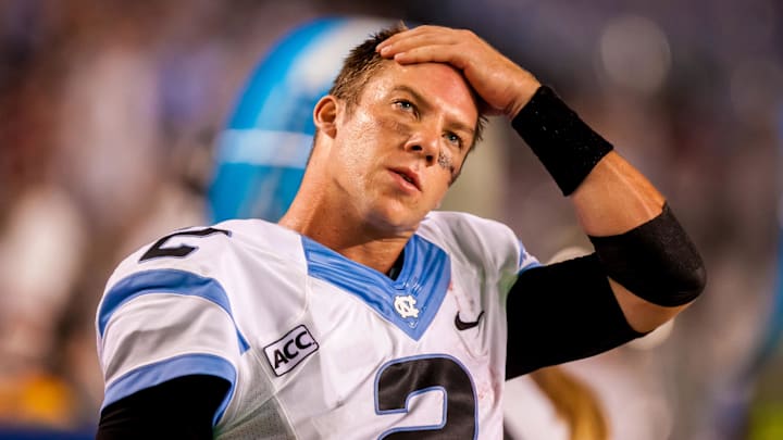 Aug 29, 2013; Columbia, SC, USA; North Carolina Tar Heels quarterback Bryn Renner (2) watches the clock tick away against the South Carolina Gamecocks in the fourth quarter at Williams-Brice Stadium. Aug 29, 2013; Columbia, SC, USA; North Carolina Tar Heels quarterback Bryn Renner (2) watches the clock tick away against the South Carolina Gamecocks in the fourth quarter at Williams-Brice Stadium.