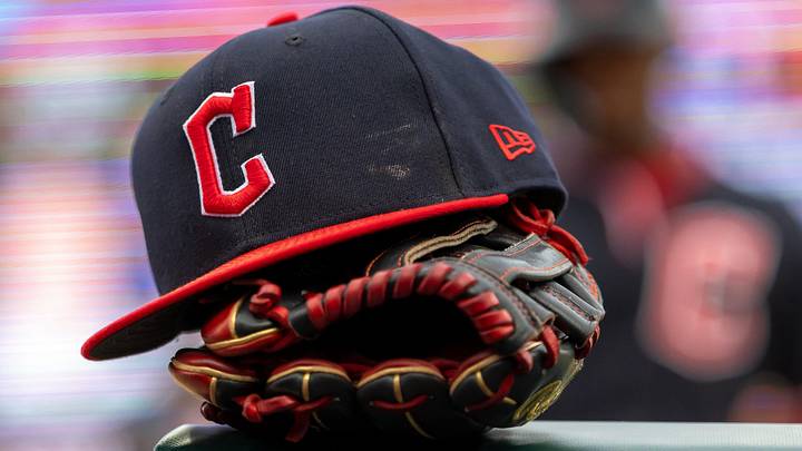 May 20, 2026; Detroit, Michigan, USA; A Cleveland Guardians hat and glove sit on the rail of the dugout during the first inning against the Detroit Tigers at Comerica Park. Mandatory Credit: David Reginek-Imagn Images