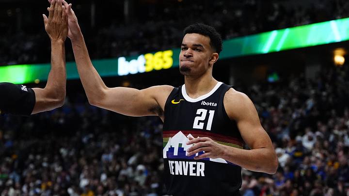 Dec 25, 2025; Denver, Colorado, USA; Denver Nuggets forward Spencer Jones (21) reacts against the Minnesota Timberwolves during the second half at Ball Arena. Mandatory Credit: Ron Chenoy-Imagn Images Dec 25, 2025; Denver, Colorado, USA; Denver Nuggets forward Spencer Jones (21) reacts against the Minnesota Timberwolves during the second half at Ball Arena. Mandatory Credit: Ron Chenoy-Imagn Images