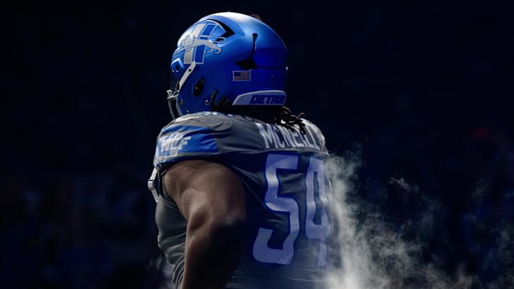 Detroit Lions defensive tackle Alim McNeill was watching a popular sitcom as his contract extension was finalized.