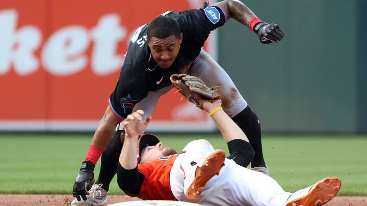 Jul 12, 2025; Baltimore, Maryland, USA; Miami Marlins outfielder Dane Myers (54) gets caught stealing second by Baltimore Orioles shortstop Gunnar Henderson (2) during the fifth inning at Oriole Park at Camden Yards. Mandatory Credit: Daniel Kucin Jr.-Imagn Images Jul 12, 2025; Baltimore, Maryland, USA; Miami Marlins outfielder Dane Myers (54) gets caught stealing second by Baltimore Orioles shortstop Gunnar Henderson (2) during the fifth inning at Oriole Park at Camden Yards. Mandatory Credit: Daniel Kucin Jr.-Imagn Images