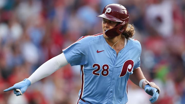 Aug 15, 2024; Philadelphia, Pennsylvania, USA; Philadelphia Phillies third base Alec Bohm (28) reacts after hitting a three-run home run during the first inning against the Washington Nationals at Citizens Bank Park.