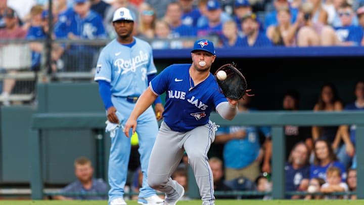Sep 20, 2025; Kansas City, Missouri, USA; Toronto Blue Jays first base Ty France (2) reaches for a throw to first base during the second inning against the Kansas City Royals at Kauffman Stadium. Mandatory Credit: William Purnell-Imagn Images Sep 20, 2025; Kansas City, Missouri, USA; Toronto Blue Jays first base Ty France (2) reaches for a throw to first base during the second inning against the Kansas City Royals at Kauffman Stadium. Mandatory Credit: William Purnell-Imagn Images