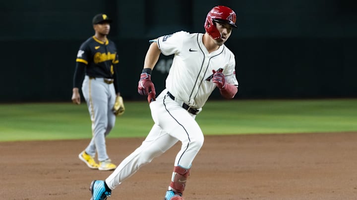 May 27, 2025; Phoenix, Arizona, USA; Arizona Diamondbacks outfielder Corbin Carroll rounds the bases after hitting a solo home run in the first inning against the Pittsburgh Pirates at Chase Field. Mandatory Credit: Mark J. Rebilas-Imagn Images