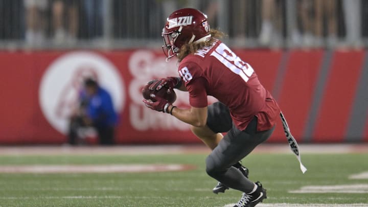 Sep 20, 2024; Pullman, Washington, USA; Washington State Cougars wide receiver Josh Meredith (18) makes a catch against the San Jose State Spartans in the first half at Gesa Field at Martin Stadium. Mandatory Credit: James Snook-Imagn Images