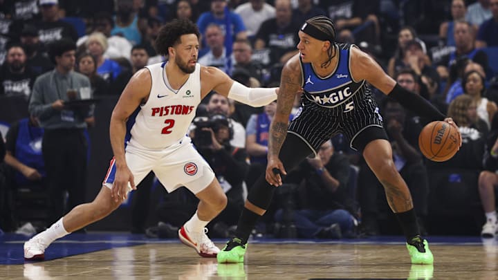Apr 25, 2026; Orlando, Florida, USA; Detroit Pistons guard Cade Cunningham (2) guards Orlando Magic forward Paolo Banchero (5) in the first quarter during game three of the first round of the 2026 NBA Playoffs at Kia Center. Mandatory Credit: Nathan Ray Seebeck-Imagn Images