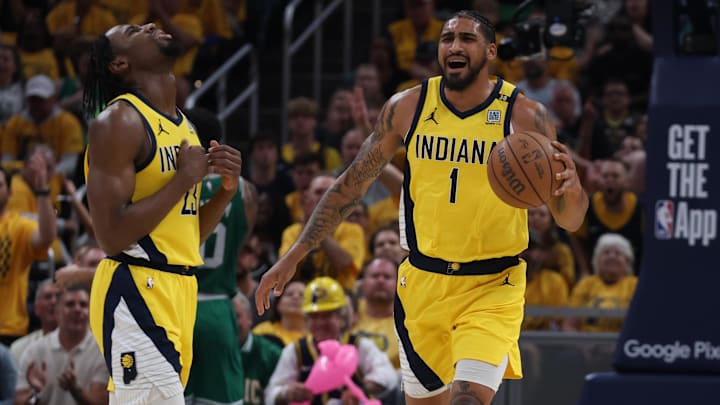 May 25, 2024; Indianapolis, Indiana, USA; Indiana Pacers forward Aaron Nesmith (23) and forward Obi Toppin (1) react during the first quarter of game three of the eastern conference finals against the Boston Celtics in the 2024 NBA playoffs at Gainbridge Fieldhouse. Mandatory Credit: Trevor Ruszkowski-Imagn Images