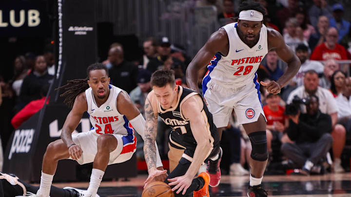 Nov 18, 2025; Atlanta, Georgia, USA; Atlanta Hawks guard Vit Krejci (27) dives for a loose ball with Detroit Pistons guard Daniss Jenkins (24) and forward Isaiah Stewart (28) in the second quarter at State Farm Arena. Mandatory Credit: Brett Davis-Imagn Images
Nov 18, 2025; Atlanta, Georgia, USA; Atlanta Hawks guard Vit Krejci (27) dives for a loose ball with Detroit Pistons guard Daniss Jenkins (24) and forward Isaiah Stewart (28) in the second quarter at State Farm Arena. Mandatory Credit: Brett Davis-Imagn Images