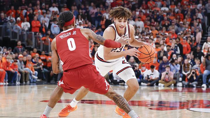 Nov 19, 2025; Chicago, Illinois, USA; Illinois Fighting Illini guard Keaton Wagler (23) is defended by Alabama Crimson Tide guard Labaron Philon (0) during the first half at United Center. Mandatory Credit: Kamil Krzaczynski-Imagn Images Nov 19, 2025; Chicago, Illinois, USA; Illinois Fighting Illini guard Keaton Wagler (23) is defended by Alabama Crimson Tide guard Labaron Philon (0) during the first half at United Center. Mandatory Credit: Kamil Krzaczynski-Imagn Images