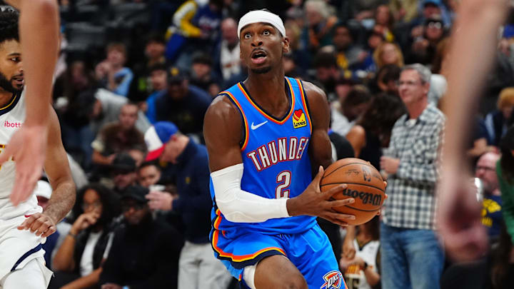 Oct 24, 2024; Denver, Colorado, USA; Oklahoma City Thunder guard Shai Gilgeous-Alexander (2) during the first quarter against the Denver Nuggets at Ball Arena. Mandatory Credit: Ron Chenoy-Imagn Images