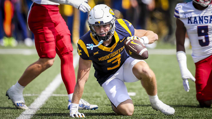Mountaineers wide receiver Hudson Clement (3) makes a catch during the second quarter against the Kansas Jayhawks at Mountaineer Field at Milan Puskar Stadium. Mandatory Credit: Ben Queen-Imagn Images