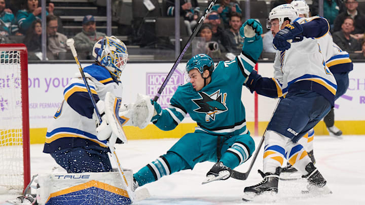 Nov 16, 2023; San Jose, California, USA; St. Louis Blues defenseman Justin Faulk (72) checks San