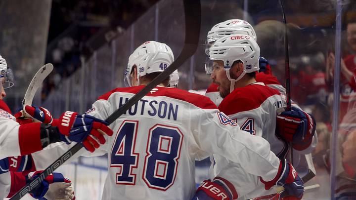 May 6, 2026; Buffalo, New York, USA; Montréal Canadiens center Nick Suzuki (14) celebrates his goal with teammates during the first period against the Buffalo Sabres in game one of the second round of the 2026 Stanley Cup Playoffs at KeyBank Center. Mandatory Credit: Timothy T. Ludwig-Imagn Images