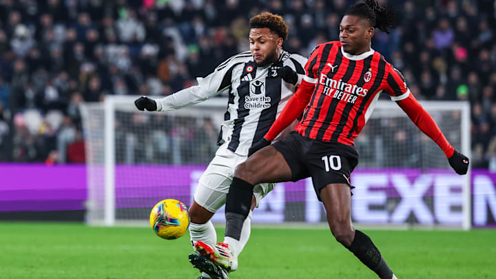 (R-L) Rafael Leao of AC Milan with Weston McKennie of...