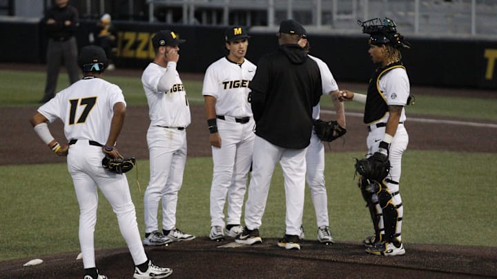 April 2, 2025; Columbia, Missouri, USA: Missouri head coach Kerrick Jackson talks with his players during a pitching change. April 2, 2025; Columbia, Missouri, USA: Missouri head coach Kerrick Jackson talks with his players during a pitching change.