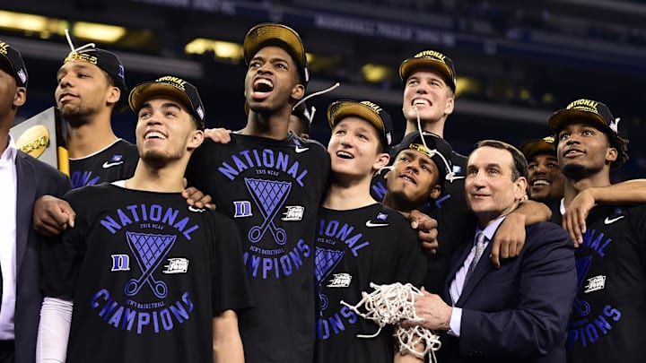 Apr 6, 2015; Indianapolis, IN, USA; Duke Blue Devils head coach Mike Krzyzewski and his players including Quinn Cook watch "One Shining Moment" after defeating the Wisconsin Badgers in the 2015 NCAA Men's Division I Championship game at Lucas Oil Stadium. Mandatory Credit: Bob Donnan-Imagn Images