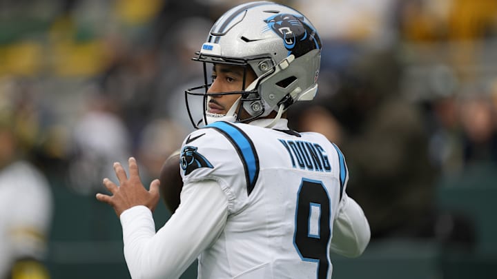 Nov 2, 2025; Green Bay, Wisconsin, USA; Carolina Panthers quarterback Bryce Young (9) warms up before a game against the Green Bay Packers at Lambeau Field. 