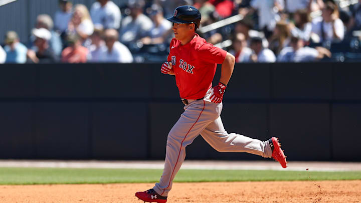 Mar 18, 2025; Tampa, Florida, USA; Boston Red Sox outfielder Masataka Yoshida (7) runs the bases after hitting a two run home run against the New York Yankees in the sixth inning during spring training at George M. Steinbrenner Field. Mandatory Credit: Nathan Ray Seebeck-Imagn Images