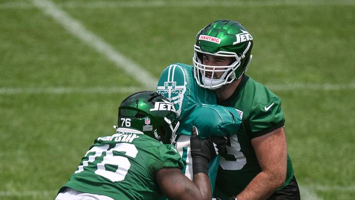 Former New York Jets guard John Simpson and center Gus Hartwig