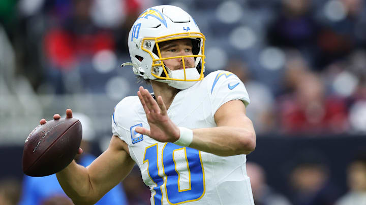 Chargers' quarterback Justin Herbert looks to throw during the 2024 AFC Wild Card Playoffs against the Houston Texans.