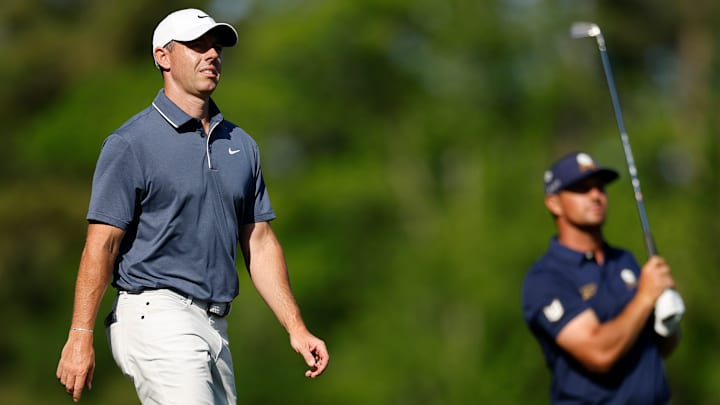 Rory McIlroy (left) had nothing to say to Bryson DeChambeau during the final round of the Masters. 