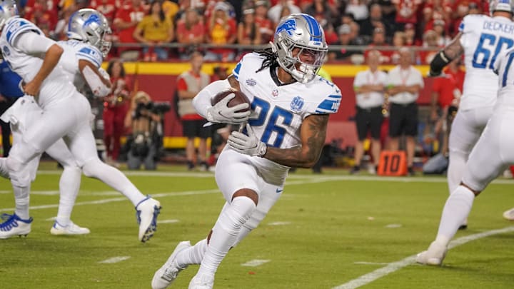 Detroit Lions running back Jahmyr Gibbs (26) runs the ball.