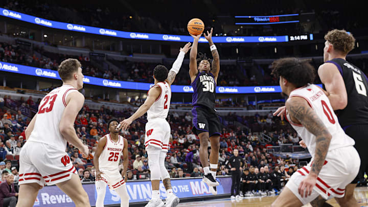 Mar 12, 2026; Chicago, IL, USA; Washington Huskies guard Courtland Muldrew (30) shoots against the Wisconsin Badgers during the first half at United Center. Mandatory Credit: Kamil Krzaczynski-Imagn Images