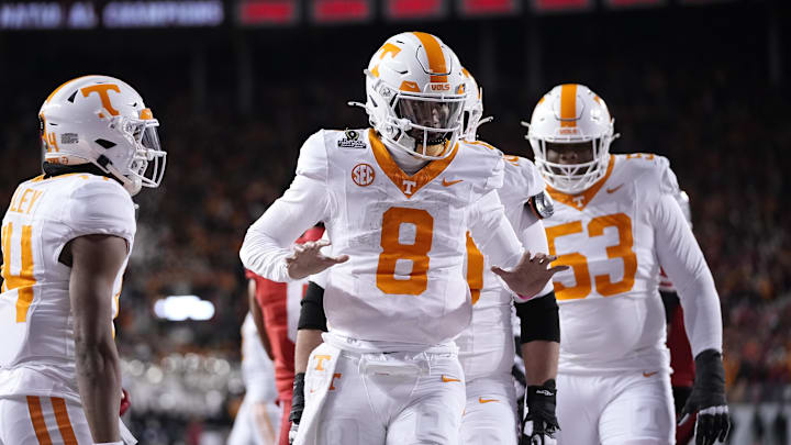 Dec 21, 2024; Columbus, Ohio, USA; Tennessee Volunteers quarterback Nico Iamaleava (8) celebrates after running for a touchdown against the Ohio State Buckeyes during the first half of a College Football Playoff first round game at Ohio Stadium. Mandatory Credit: Adam Cairns-Imagn Images