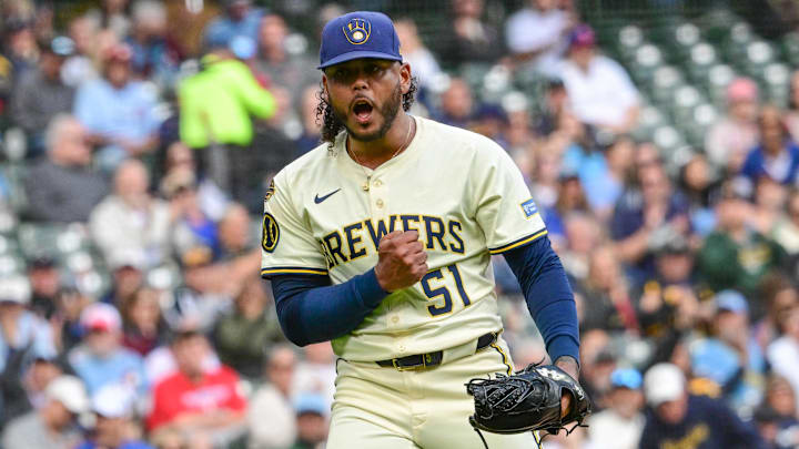 Sep 4, 2025; Milwaukee, Wisconsin, USA; Milwaukee Brewers starting pitcher Freddy Peralta (51) reacts after striking out Philadelphia Phillies third baseman Alec Bohm (not pictured) with the bases loaded in the fourth inning at American Family Field. Mandatory Credit: Benny Sieu-Imagn Images Sep 4, 2025; Milwaukee, Wisconsin, USA; Milwaukee Brewers starting pitcher Freddy Peralta (51) reacts after striking out Philadelphia Phillies third baseman Alec Bohm (not pictured) with the bases loaded in the fourth inning at American Family Field. Mandatory Credit: Benny Sieu-Imagn Images