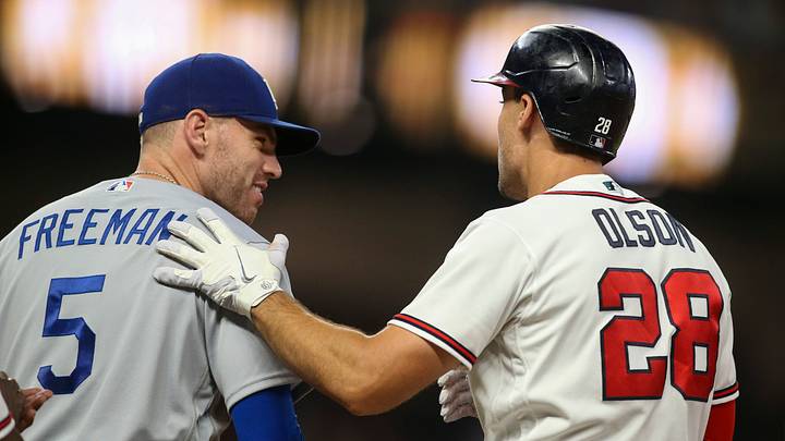Jun 26, 2022; Atlanta, Georgia, USA; Los Angeles Dodgers first baseman Freddie Freeman (5) talks to Atlanta Braves first baseman Matt Olson (28) in the tenth inning at Truist Park. Mandatory Credit: Brett Davis-USA TODAY Sports