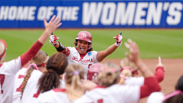 Oklahoma slugger Ella Parker celebrates a home run at the WCWS.