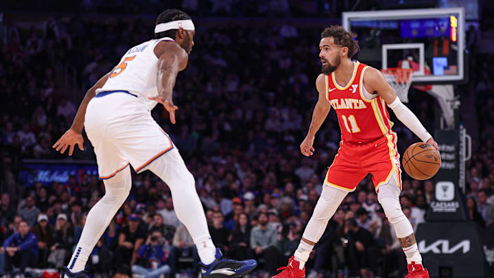 Jan 20, 2025; New York, New York, USA; Atlanta Hawks guard Trae Young (11) is guarded by New York Knicks forward Precious Achiuwa (5) during the second half at Madison Square Garden. Mandatory Credit: Vincent Carchietta-Imagn Images Jan 20, 2025; New York, New York, USA; Atlanta Hawks guard Trae Young (11) is guarded by New York Knicks forward Precious Achiuwa (5) during the second half at Madison Square Garden. Mandatory Credit: Vincent Carchietta-Imagn Images