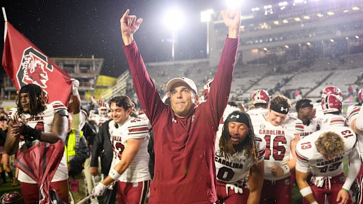 Nov 9, 2024; Nashville, Tennessee, USA;  South Carolina Gamecocks head coach Shane Beamer and his team celebrate the after defeating the Vanderbilt Commodores at FirstBank Stadium. Mandatory Credit: Steve Roberts-Imagn Images