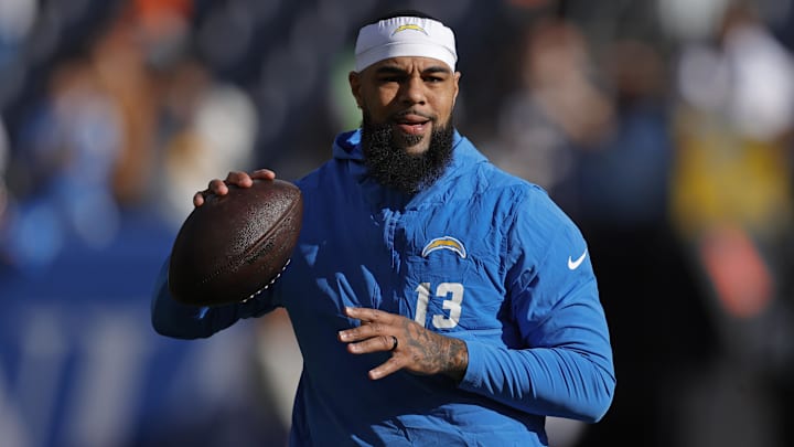Jan 4, 2026; Denver, Colorado, USA; Los Angeles Chargers wide receiver Keenan Allen (13) warms up before the game against the Denver Broncos at Empower Field at Mile High. Mandatory Credit: Isaiah J. Downing-Imagn Images