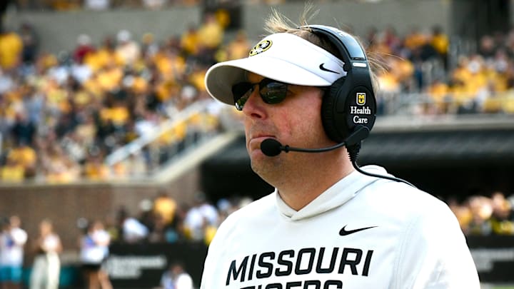 Sep 6, 2025; Columbia, Missouri, USA; Missouri Tigers coach Eli Drinkwitz watches from the sideline in the second half of the Border War against the Kansas Jayhawks at Faurot Field at Memorial Stadium.