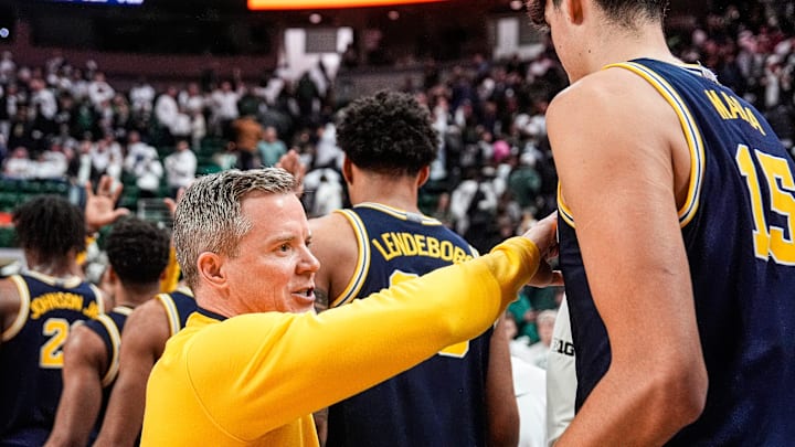 Michigan head coach Dusty May congratulates players after 83-71 win over Michigan State at Breslin Center in East Lansing on Friday, Jan. 30, 2026.