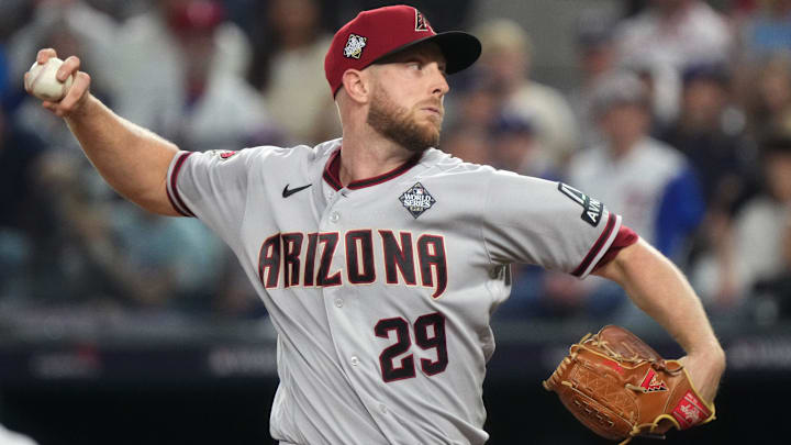 Arizona Diamondbacks starting pitcher Merrill Kelly (29) throws a pitch against the Texas Rangers during the first inning in game two of the 2023 World Series at Globe Life Field on Oct. 28, 2023, Arlington, Texas Arizona Diamondbacks starting pitcher Merrill Kelly (29) throws a pitch against the Texas Rangers during the first inning in game two of the 2023 World Series at Globe Life Field on Oct. 28, 2023, Arlington, Texas