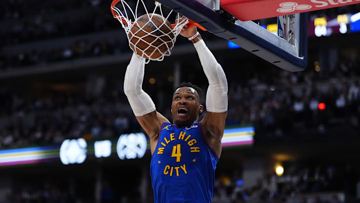 Apr 19, 2025; Denver, Colorado, USA; Denver Nuggets guard Russell Westbrook (4) finishes off a dunk in the fourth quarter against the LA Clippers at Ball Arena. Mandatory Credit: Ron Chenoy-Imagn Images Apr 19, 2025; Denver, Colorado, USA; Denver Nuggets guard Russell Westbrook (4) finishes off a dunk in the fourth quarter against the LA Clippers at Ball Arena. Mandatory Credit: Ron Chenoy-Imagn Images