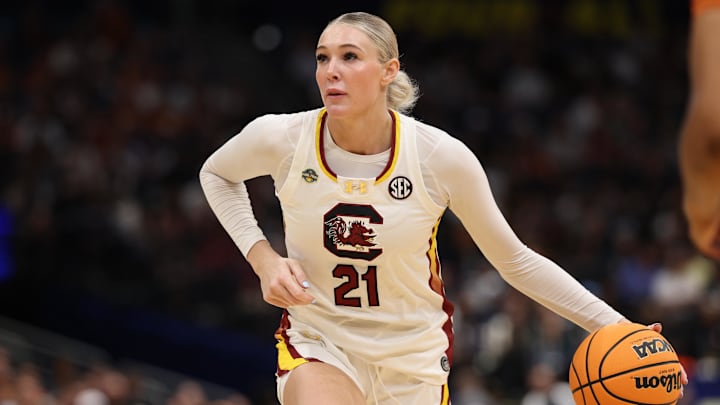 Apr 4, 2025; Tampa, FL, USA; South Carolina Gamecocks forward Chloe Kitts (21) controls the ball against the Texas Longhorns during the third quarter in a semifinal of the women's 2025 NCAA tournament at Amalie Arena. Mandatory Credit: Nathan Ray Seebeck-Imagn Images Apr 4, 2025; Tampa, FL, USA; South Carolina Gamecocks forward Chloe Kitts (21) controls the ball against the Texas Longhorns during the third quarter in a semifinal of the women's 2025 NCAA tournament at Amalie Arena. Mandatory Credit: Nathan Ray Seebeck-Imagn Images