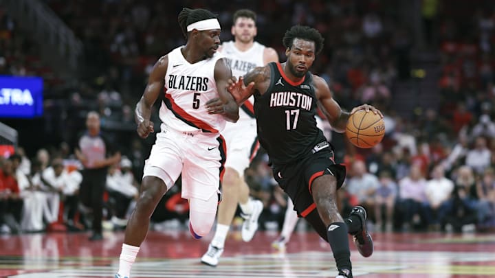 Nov 14, 2025; Houston, Texas, USA; Houston Rockets forward Tari Eason (17) drives with the ball as Portland Trail Blazers guard Jrue Holiday (5) defends during the second quarter at Toyota Center. Mandatory Credit: Troy Taormina-Imagn Images Nov 14, 2025; Houston, Texas, USA; Houston Rockets forward Tari Eason (17) drives with the ball as Portland Trail Blazers guard Jrue Holiday (5) defends during the second quarter at Toyota Center. Mandatory Credit: Troy Taormina-Imagn Images