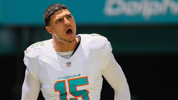 Sep 8, 2024; Miami Gardens, Florida, USA; Miami Dolphins linebacker Jaelan Phillips (15) runs onto the field before the game against the Jacksonville Jaguars at Hard Rock Stadium. Mandatory Credit: Sam Navarro-Imagn Images